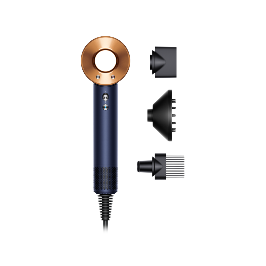Sèche-cheveux Dyson Supersonic bleu de prusse et cuivré, avec ses embouts, sur fond blanc